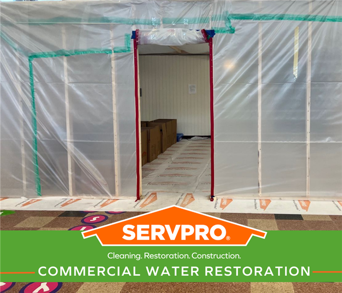 servpro restoring water damage in commercial building