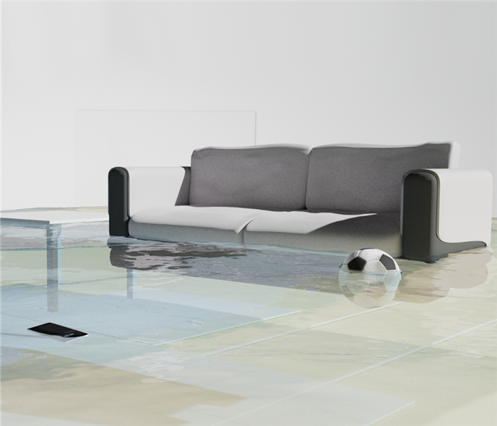 A couch in the living room is under water.